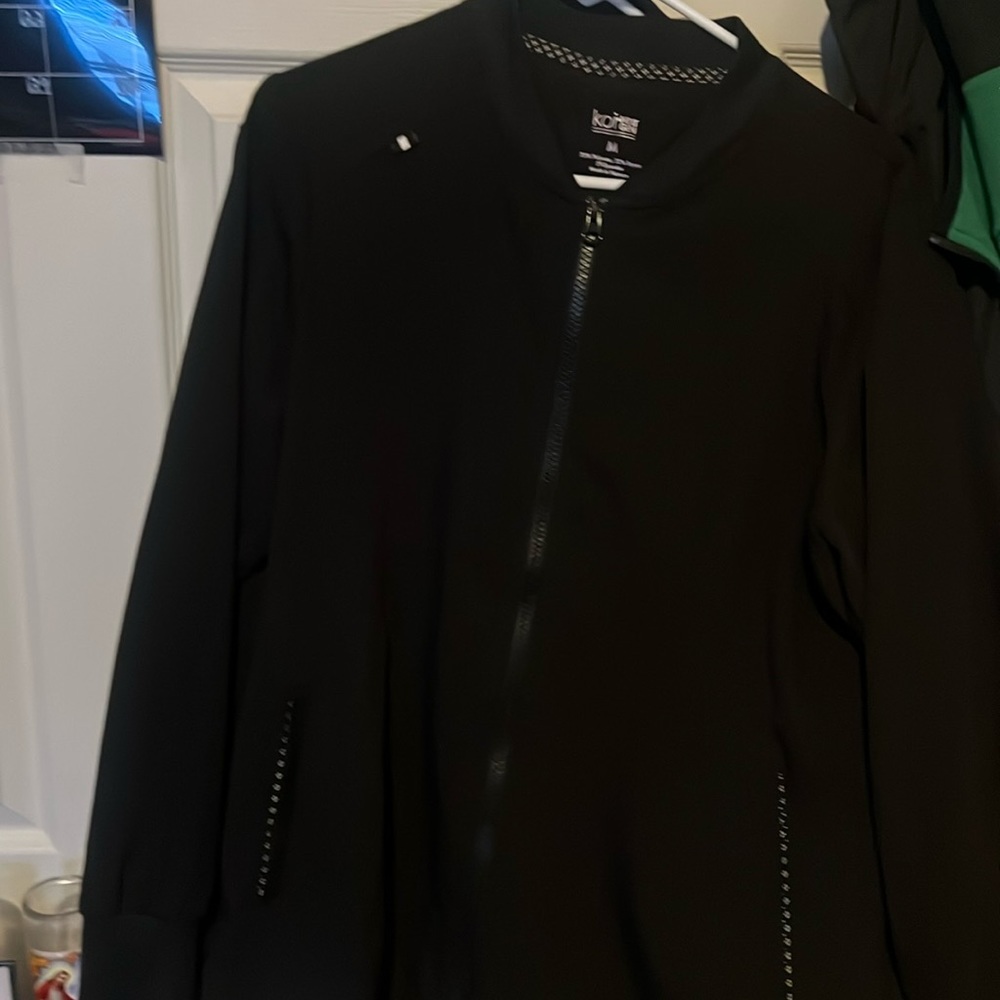 Koi zip up jacket, barely worn.